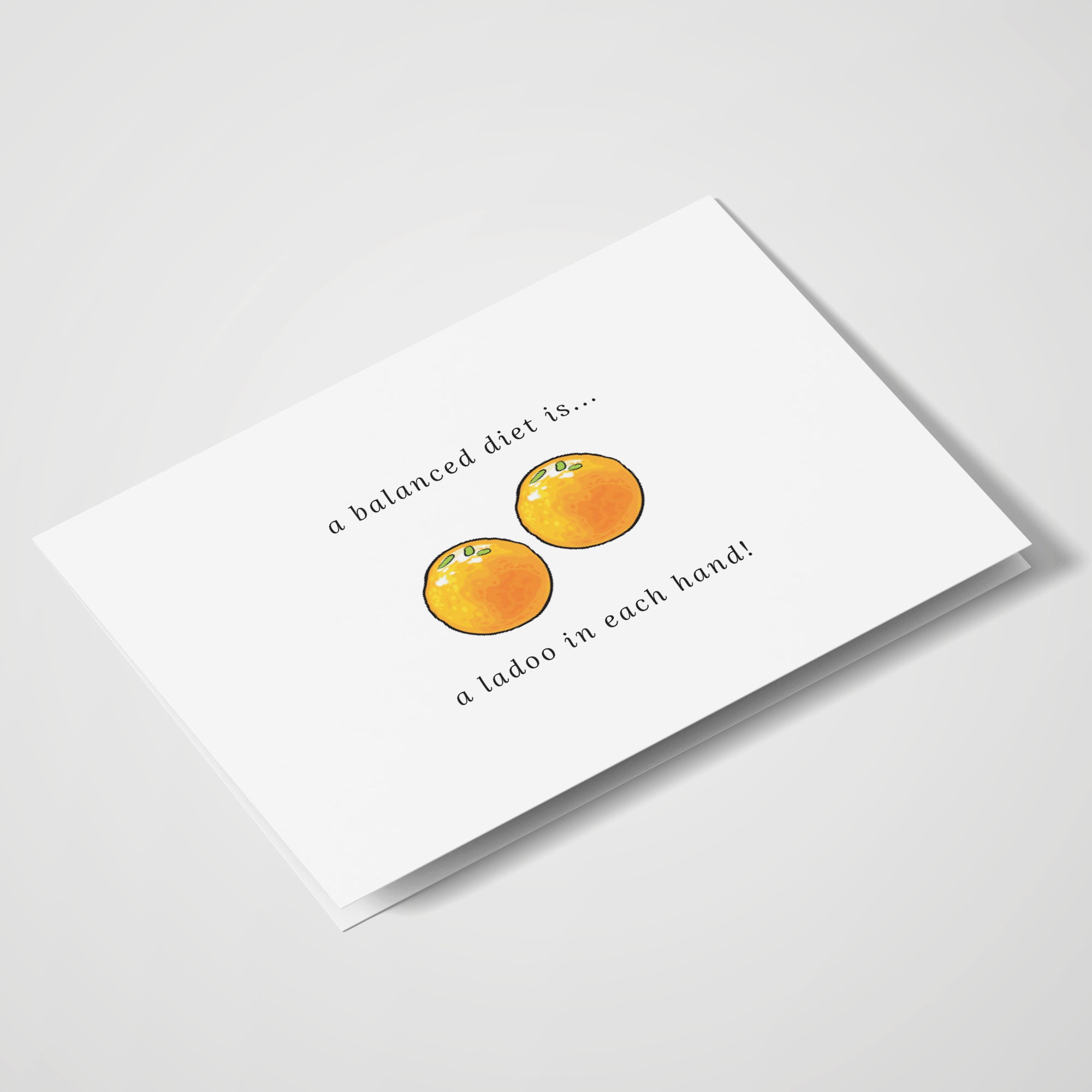 A Balanced Diet Is... a Ladoo in Each Hand